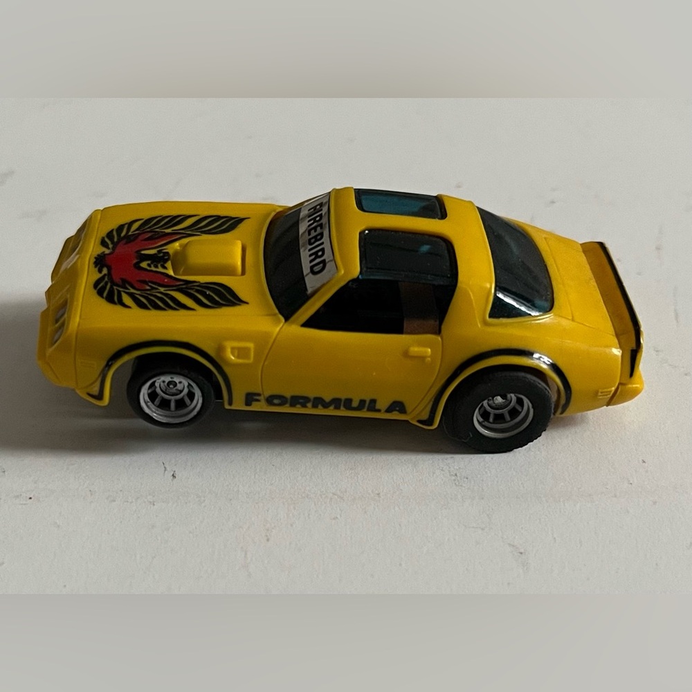 Vintage AFX Pontiac Firebird Yellow with Red & Black Trans Am Slot Car rare